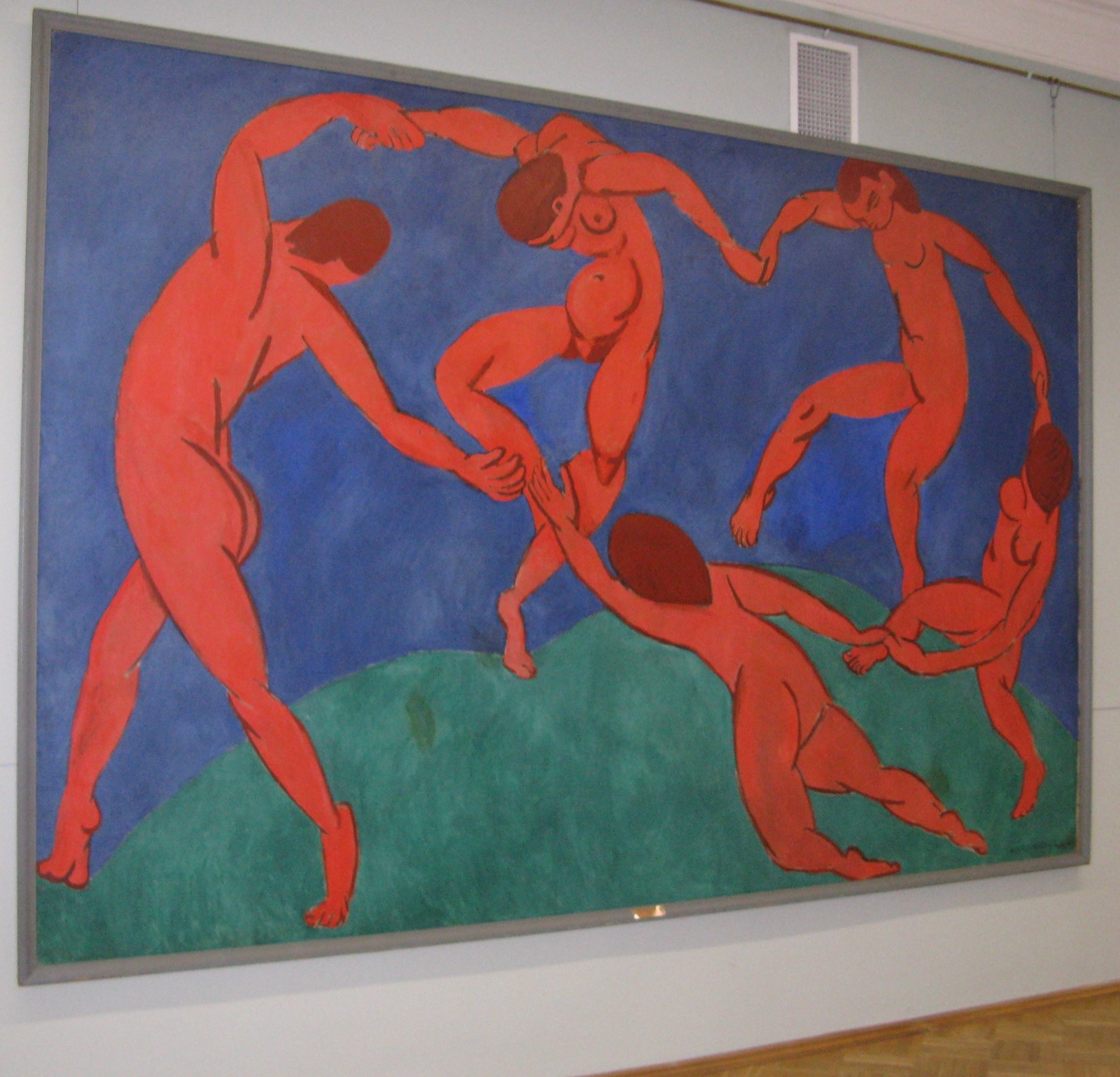 Five red figures join hands in a circle against blue and green — pure movement, pure connection, the geometry of joy made visible